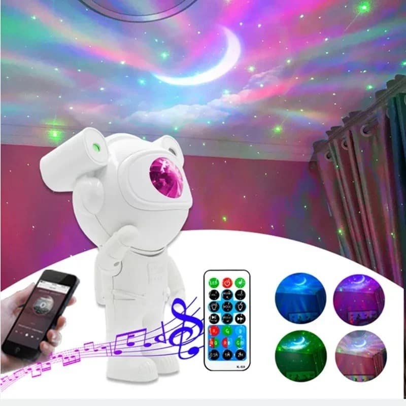 Astronaut-shaped galaxy projector casting stars and nebula across a bedroom ceiling